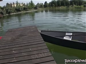 Misha Crossrides Rocco's pecker by the lake
